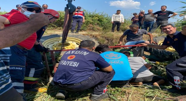 Devrilen traktörün altına kalan şahıs yaralı kurtuldu