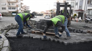 Kuşadası'nda yol yapım çalışmaları hız kesmeden devam ediyor