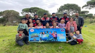 Jandarma öğrencilerle birlikte fidanları toprakla buluşturdu