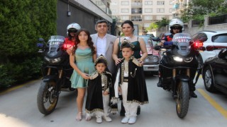 Hem teşkilat gururunu hem baba sevincini bir arada yaşadı